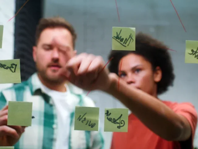 Team with post-it notes planning